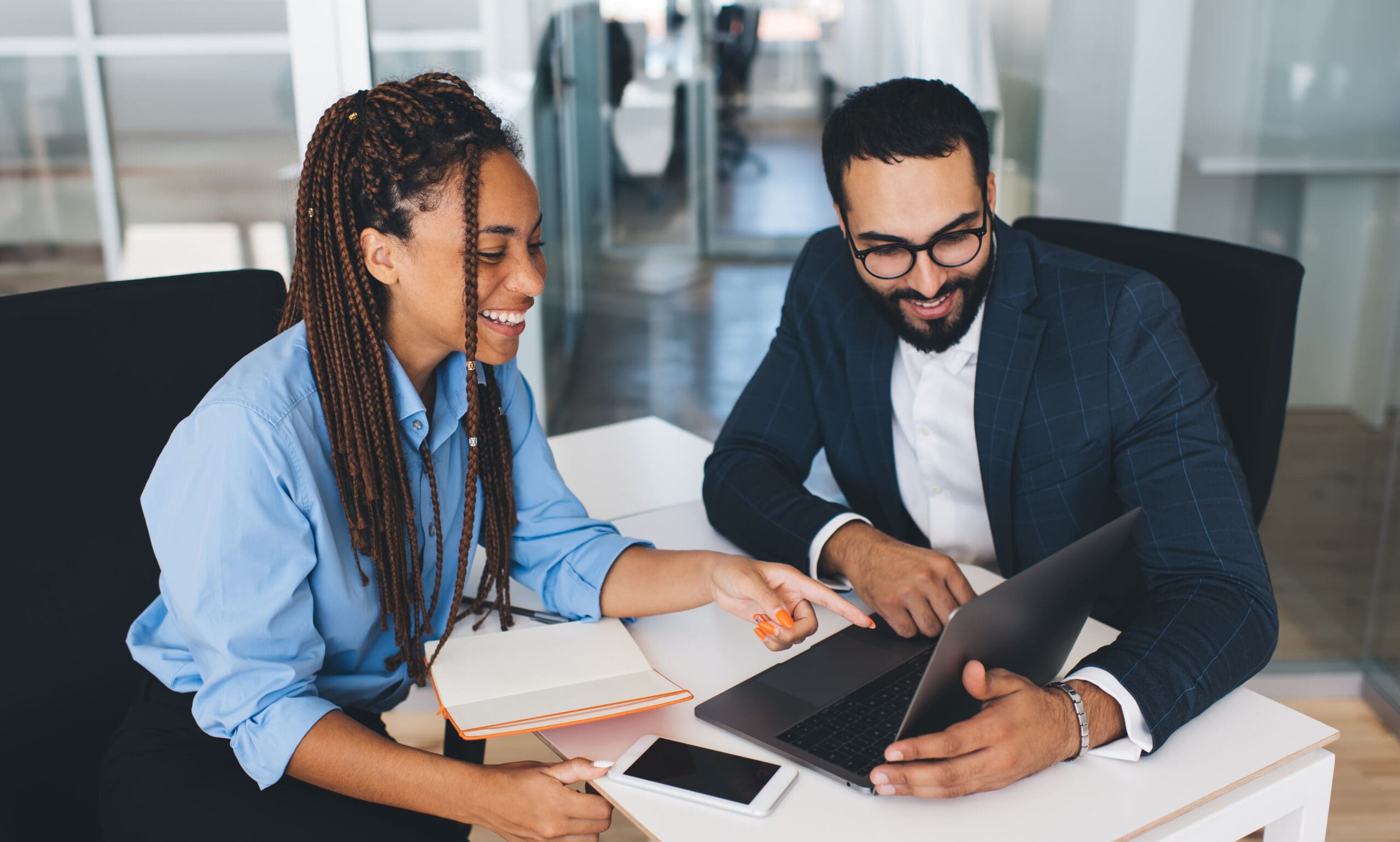 People looking at a computer screen together