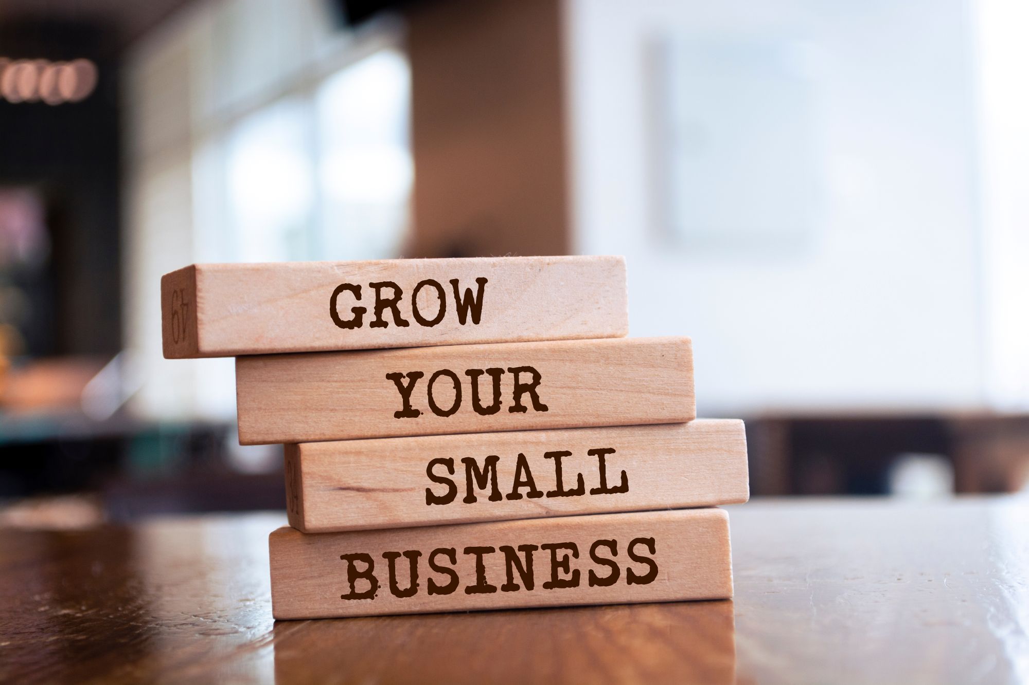 Video showing blocks labeled "grow your small business"